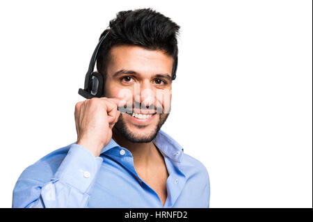 Call Center männlichen Betreiber isoliert auf weiss Stockfoto