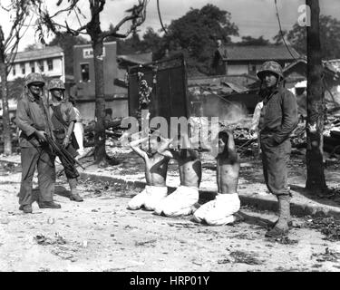 Korea-Krieg, US-Marines mit Kriegsgefangenen, 1950 Stockfoto