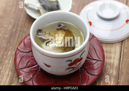 Sake aromatisiert mit gegrilltem Blowfish flossen Stockfoto