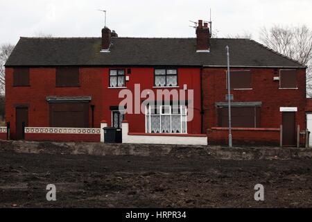 Mit Brettern vernagelt Häuser in Beswick, East Manchester, England, UK Stockfoto