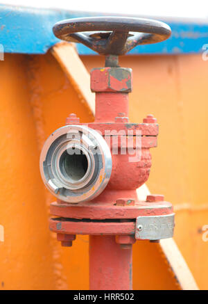 Detail von einem roten Hydranten Stockfoto