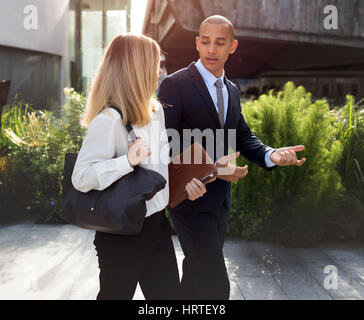 Business Talk Männer-Frauen-Agenda Stockfoto