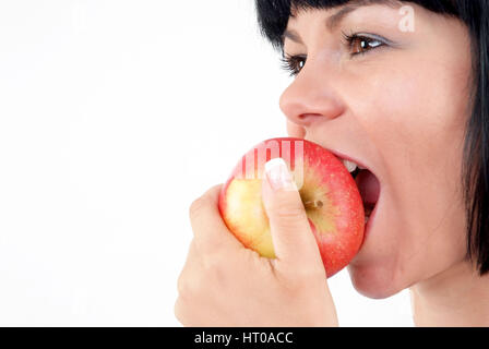 Frau Isst Apfel - isst Frau Apfel Stockfoto