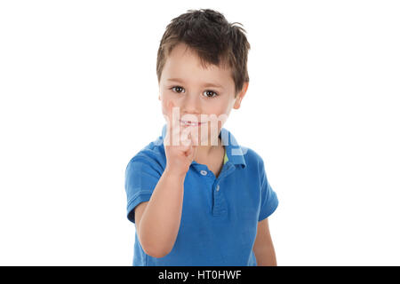 Schuljunge zeigte mit dem Finger. Isoliert auf weißem Hintergrund. Stockfoto