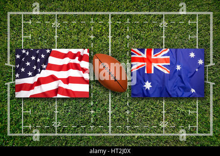 USA vs. Australien Flaggen auf grüne Rugby-Feld Stockfoto