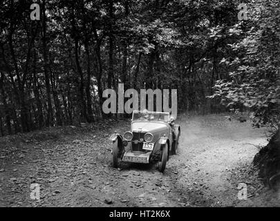 MG J2 im Wettbewerb in der B & HMC Brighton-Bier Trial, Fingle Bridge Hill, Devon, 1934. Künstler: Bill Brunell. Stockfoto