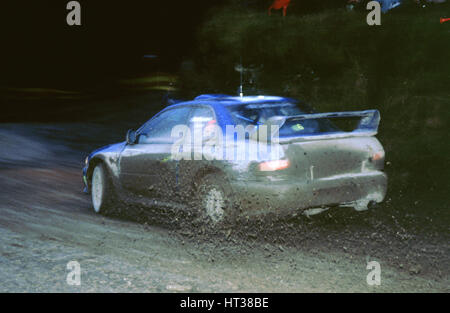 Juha Kankkunen, 1999 Subaru Impreza WRC Netzwerk Q Rallye. Künstler: unbekannt. Stockfoto