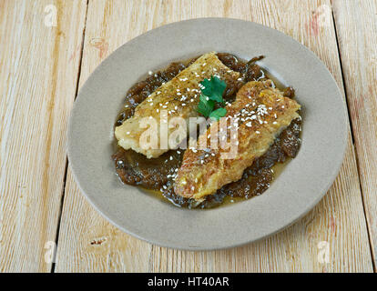 Pfanne gebratener Fisch mit kenianischen süß-saure Ukwaju Sauce Stockfoto