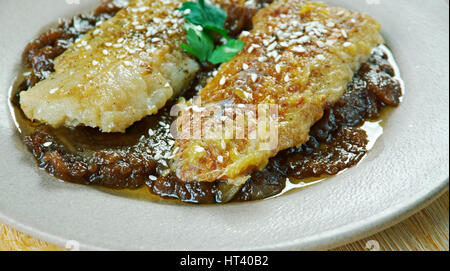 Pfanne gebratener Fisch mit kenianischen süß-saure Ukwaju Sauce Stockfoto