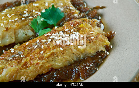 Pfanne gebratener Fisch mit kenianischen süß-saure Ukwaju Sauce Stockfoto