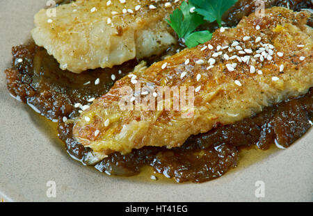 Pfanne gebratener Fisch mit kenianischen süß-saure Ukwaju Sauce Stockfoto