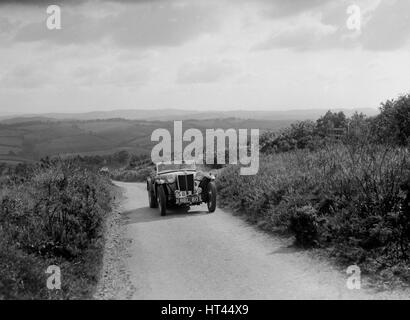 MG TA von JES Jones von der Cream Cracker-Team im Wettbewerb in der MCC-Torquay-Rallye, 1938. Künstler: Bill Brunell. Stockfoto