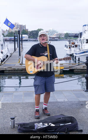 Busker am Victoria Harbour Stockfoto