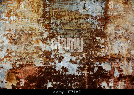 Ein rot bemalte Betonwand Textur Hintergrund. Stockfoto