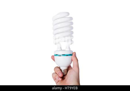 Hand, die Energiesparlampe, die isoliert auf weißem Hintergrund Stockfoto