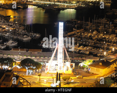 Riesenrad und Eisbahn im Port Hercule, hinter Hôtel Hermitage Monte-Carlo, Monaco, mediterran Stockfoto