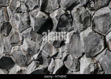 Sechskant vulkanischen Basalt Rock Formation für natürliche Zusammenfassung Hintergrund Muster, Reynisfjara, Island Stockfoto