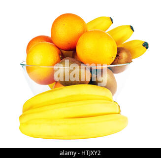 Obst im Glasschüssel isoliert auf einem weißen Stockfoto