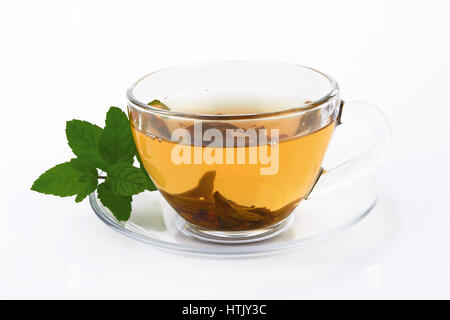 Tee in Glasschale mit Minze Stockfoto