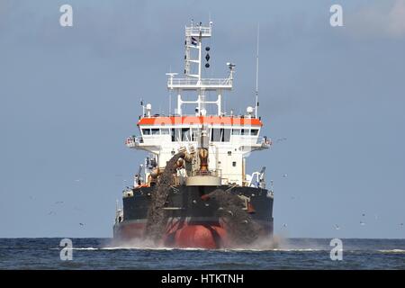 nachgestellte Sauger Trichter Bagger schaffen land Stockfoto