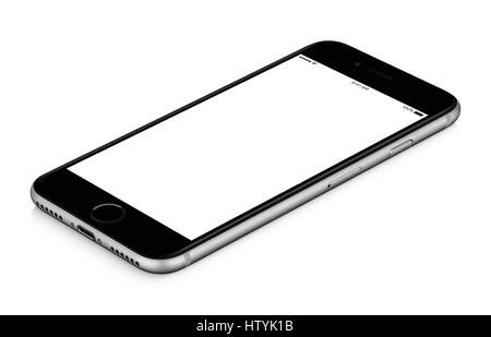 Schwarz mobile Smartphone-Modell im Uhrzeigersinn gedreht, liegt auf der Oberfläche mit unbelegten Schirm isoliert auf weißem Hintergrund. Stockfoto