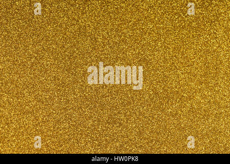 Glitzernde gold Papier Textur Blatthintergrund. Funkelnden goldenen gelben Muster. Stockfoto