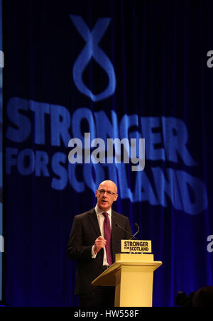 Stellvertretende erste Minister John Swinney spricht während der SNP-Frühjahrskonferenz am AECC in Aberdeen. Stockfoto