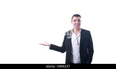 Studioaufnahme von fröhlichen Geschäftsmann hält einen imaginären Objekt Stockfoto