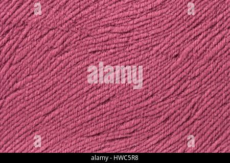 Dunkel rosa Hintergrund aus weicher Wolle Textile Material Nahaufnahme. Stoff mit natürlichen Textur. Tuch-Kulisse. Stockfoto