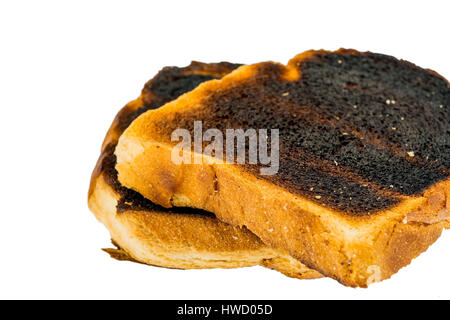 Toastbrot wurde mit Getränk einen Toast burntly. Verbranntem Toast Scheiben Toastbrot Wurde Beim Toasten Verbrannt. Erschienenen Toastscheiben Stockfoto