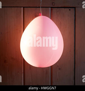 Leuchtende rosa Ballon Stockfoto