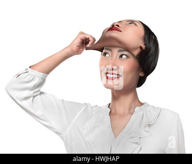 Asiatische Geschäftsfrau entfernen seine anderen Gesichtsmaske. Wechselnde Stimmung Konzept Stockfoto
