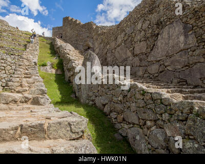 Machu Picchu, Peru - 22. Mai 2016: Wand der alten Inka-Stadt. Stockfoto