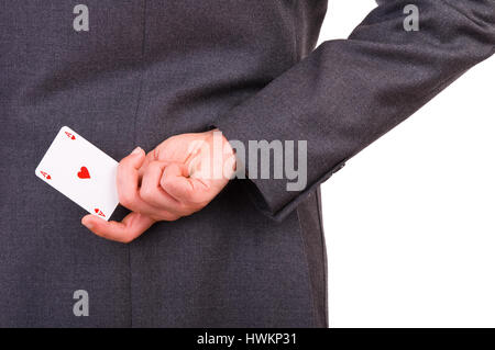 Geschäftsmann Spielkarte hinter seinem Rücken hält. Stockfoto