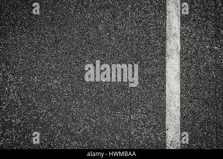 Asphalt Textur Hintergrund mit Markierungslinien Stockfoto