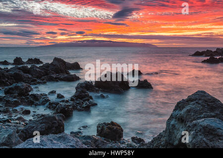 Blick auf La Gomera, Sonnenuntergang, Playa de San Juan, Teneriffa, Spanien Stockfoto