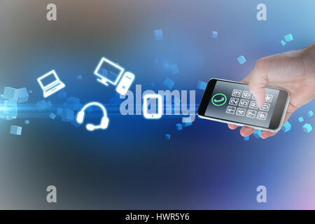 Hand mit Handy gegen futuristische Bildschirm mit Quaders beschnitten 3d Stockfoto