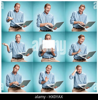 Der lächelnde junge Mann im blauen Hemd am Laptop arbeiten Stockfoto