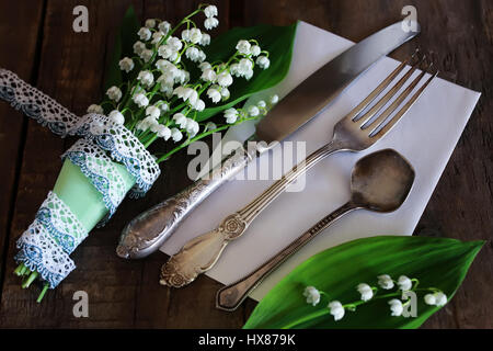 Vintage Besteck und bouquet Stockfoto