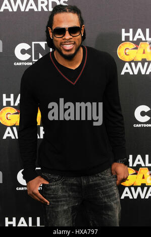 NFL-Spieler Richard Sherman von den Seattle Seahawks kommt bei den 4. jährliche Cartoon Network Halle von Game Awards Barker Hangar am 15. Februar 2014 in Santa Monica, Kalifornien. Stockfoto