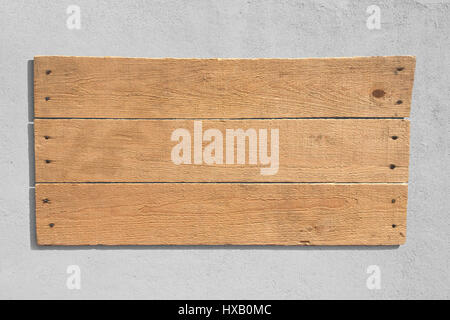 Holz Schild an einer rauhen Wand Stockfoto