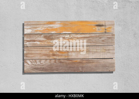 Alte Vintage Holz Schild an einer rauhen Wand. Stockfoto