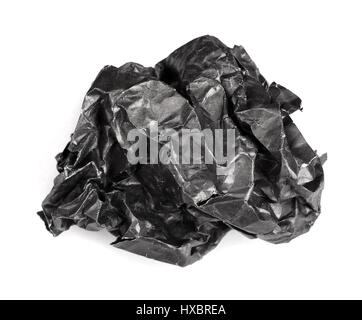 Vermasselt Stück schwarzes Papier isoliert auf weißem Hintergrund Stockfoto
