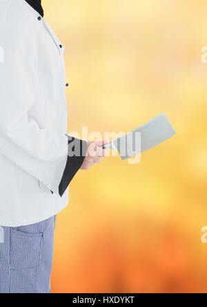 Digitalen Verbund von Küchenchef Spalter orange Hintergrund verschwommen Stockfoto