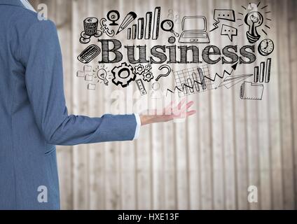 Digitalen Verbund aus Business-Mann-Seite mit der Hand nach außen und schwarzen Business Kritzeleien gegen verschwommen Holzplatte Stockfoto