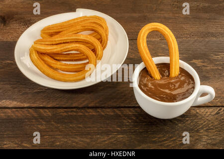 Foto von Churros con chocolate, traditionelle spanische dessert Stockfoto