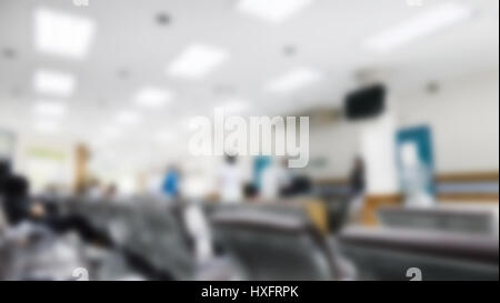 Abstrakte Foto unscharf Krankenhaus Hintergrund, Patienten sitzen Stuhl mit wartenden Sitz für sehen, Arzt, Krankenhaus und Arzt-Konzept Stockfoto