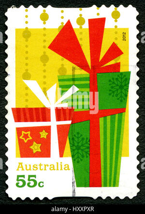 Australien - ca. 2012: Eine gebrauchte Briefmarke aus Australien, Darstellung zur Veranschaulichung der Geschenke und präsente, Weihnachten zu feiern, ca. 2012. Stockfoto