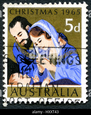 Australien - ca. 1965: Eine gebrauchte Briefmarke aus Australien, Darstellung eine festliche Weihnachten Illustration von Maria, Josef und Jesuskind ca. 1965. Stockfoto