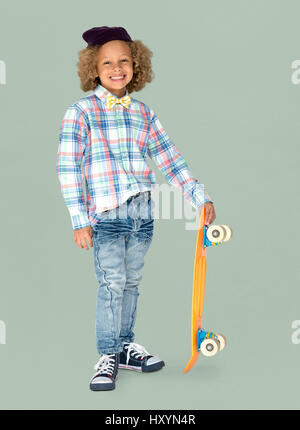 Kleiner Junge Skateboarder Lächeln Hipster Stockfoto